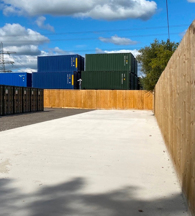 New fencing around the perimeter of a commercial yard.