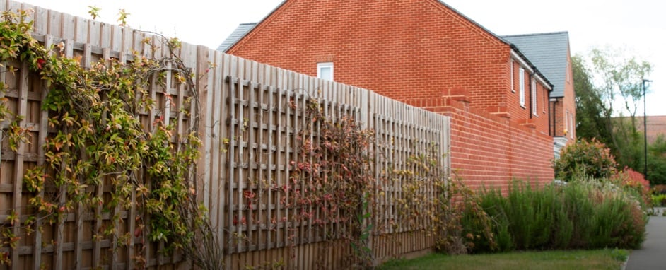 New fencing erected outside a new build house.